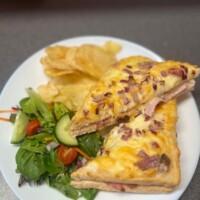Cheese & Ham Toasties Served With Salad Garnish & Crisps - Mia's bakes & cakes