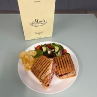 Cheese & Ham Paninis Served With Salad Garnish & Crisps